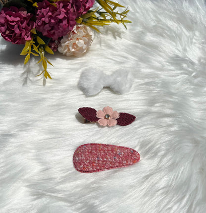 White and red hair clips ("Lucy")